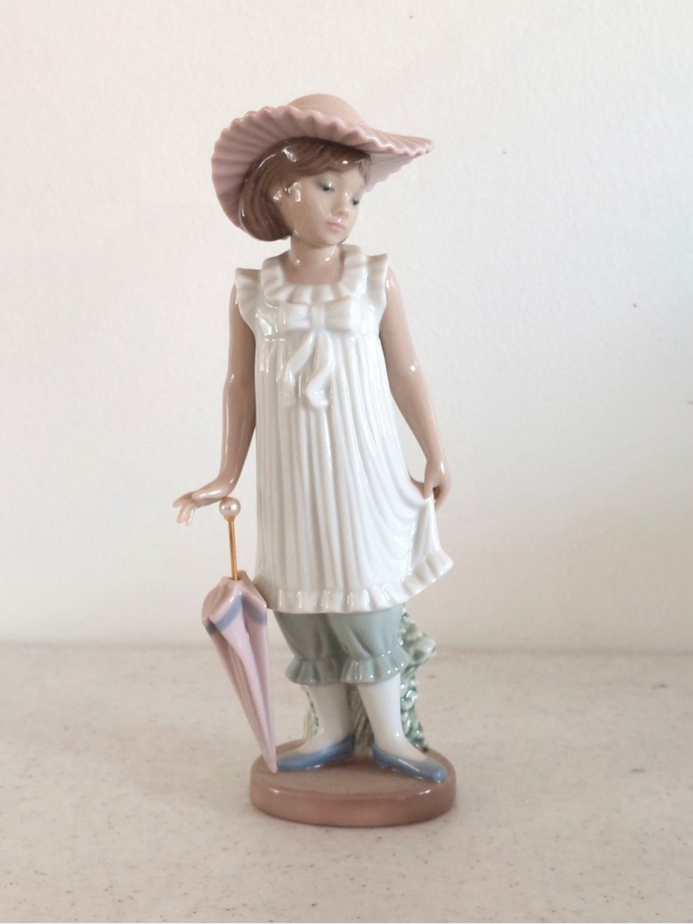 Nao by Lladro • “April Showers” Porcelain Figurine